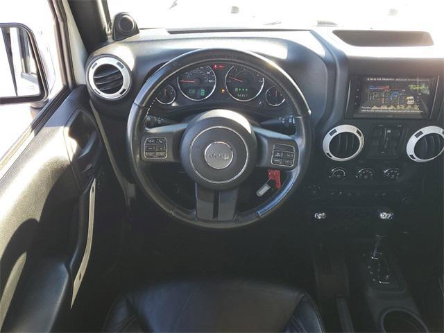 used 2013 Jeep Wrangler Unlimited car, priced at $16,998