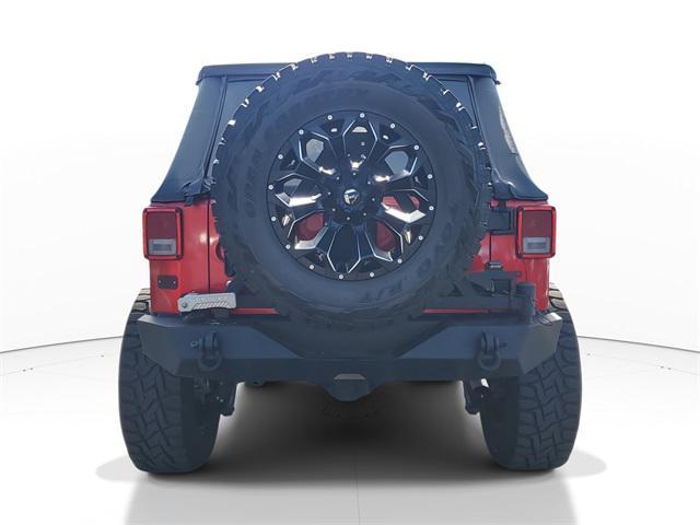 used 2013 Jeep Wrangler Unlimited car, priced at $16,444