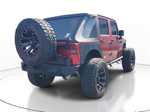 used 2013 Jeep Wrangler Unlimited car, priced at $16,444