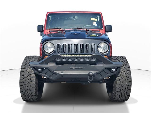 used 2013 Jeep Wrangler Unlimited car, priced at $16,444