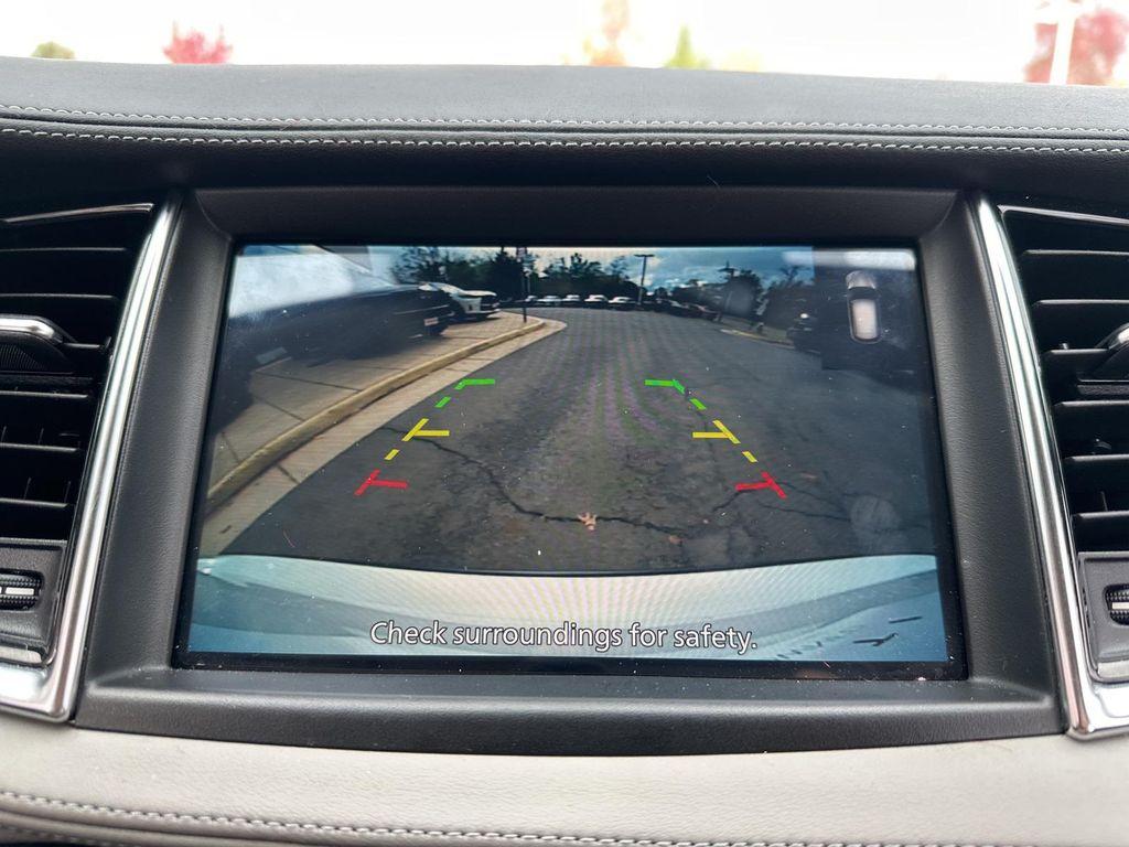 used 2025 INFINITI QX50 car, priced at $35,500