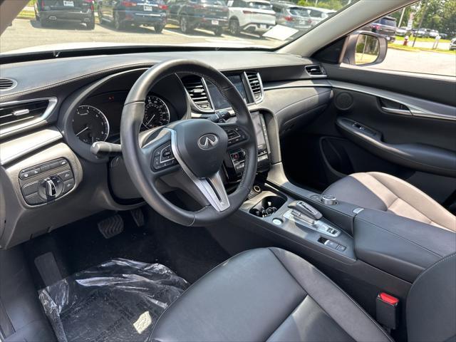 used 2024 INFINITI QX50 car, priced at $31,900