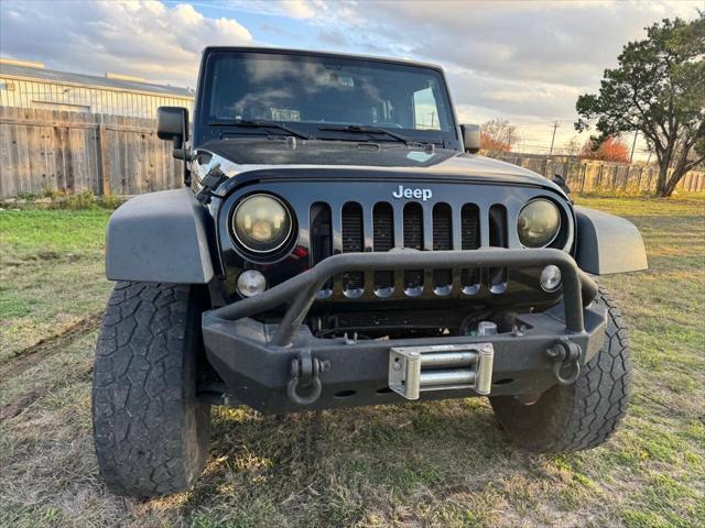 used 2016 Jeep Wrangler Unlimited car, priced at $14,999