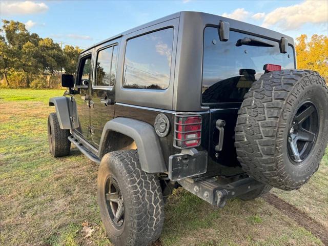 used 2016 Jeep Wrangler Unlimited car, priced at $14,999