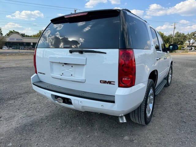 used 2013 GMC Yukon car, priced at $12,999