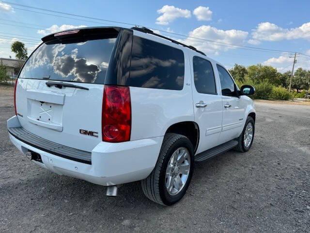 used 2013 GMC Yukon car, priced at $12,999