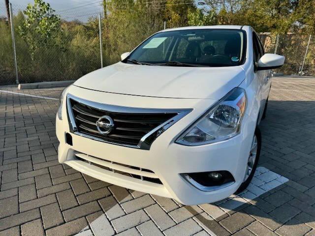 used 2018 Nissan Versa car, priced at $9,999