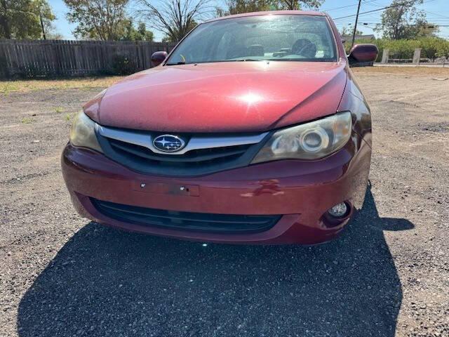 used 2011 Subaru Impreza car, priced at $7,999