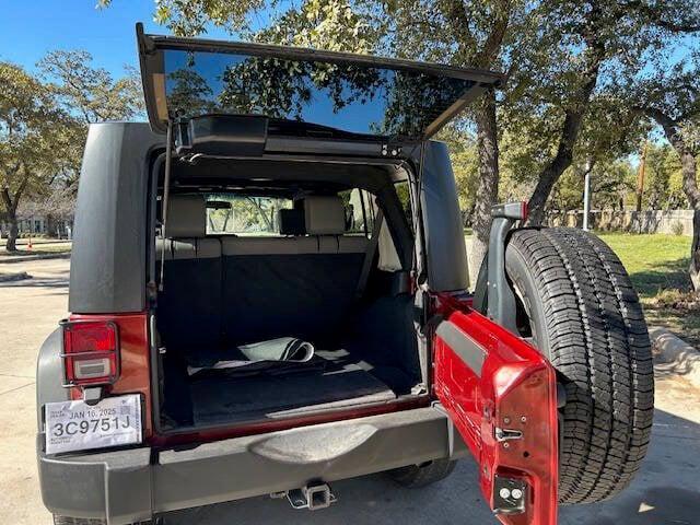 used 2010 Jeep Wrangler Unlimited car, priced at $10,999