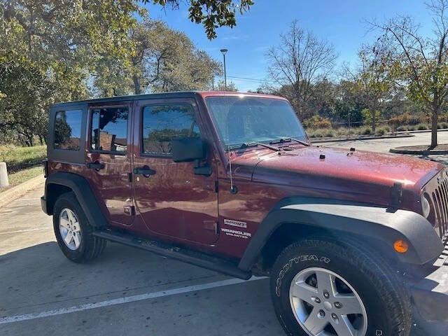 used 2010 Jeep Wrangler Unlimited car, priced at $10,999