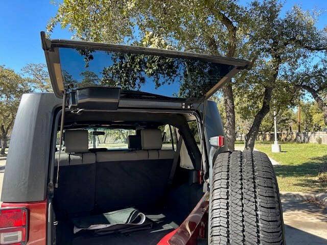 used 2010 Jeep Wrangler Unlimited car, priced at $10,999