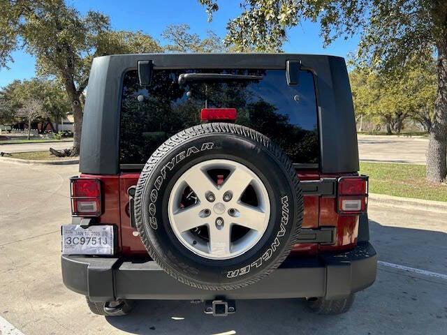 used 2010 Jeep Wrangler Unlimited car, priced at $10,999