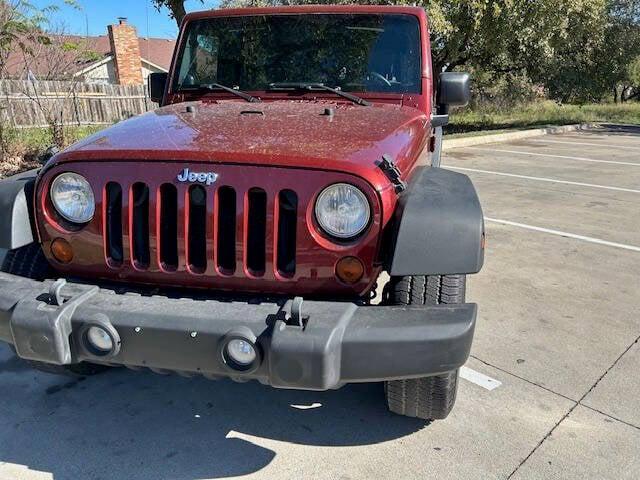 used 2010 Jeep Wrangler Unlimited car, priced at $10,999