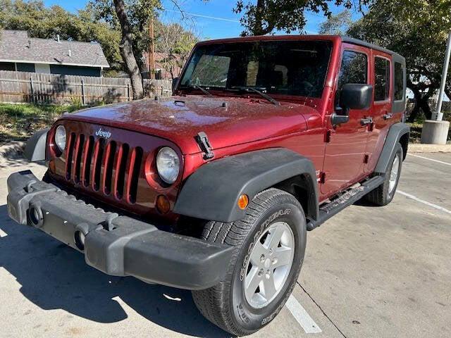 used 2010 Jeep Wrangler Unlimited car, priced at $10,999