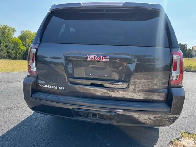 used 2015 GMC Yukon car, priced at $16,999