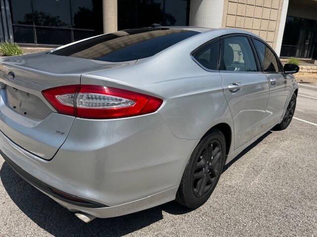 used 2016 Ford Fusion car, priced at $7,999