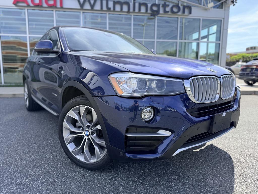 used 2018 BMW X4 car, priced at $24,589