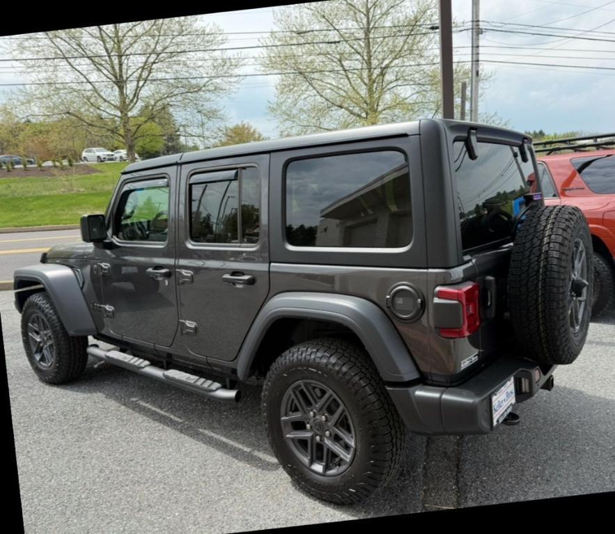 used 2024 Jeep Wrangler car, priced at $38,586