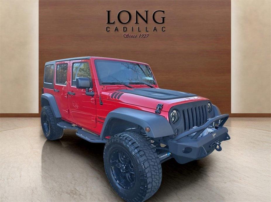 used 2016 Jeep Wrangler Unlimited car, priced at $18,991