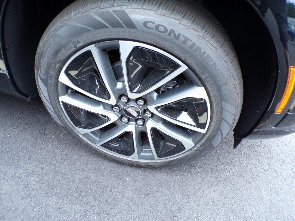new 2025 Cadillac OPTIQ car, priced at $54,990