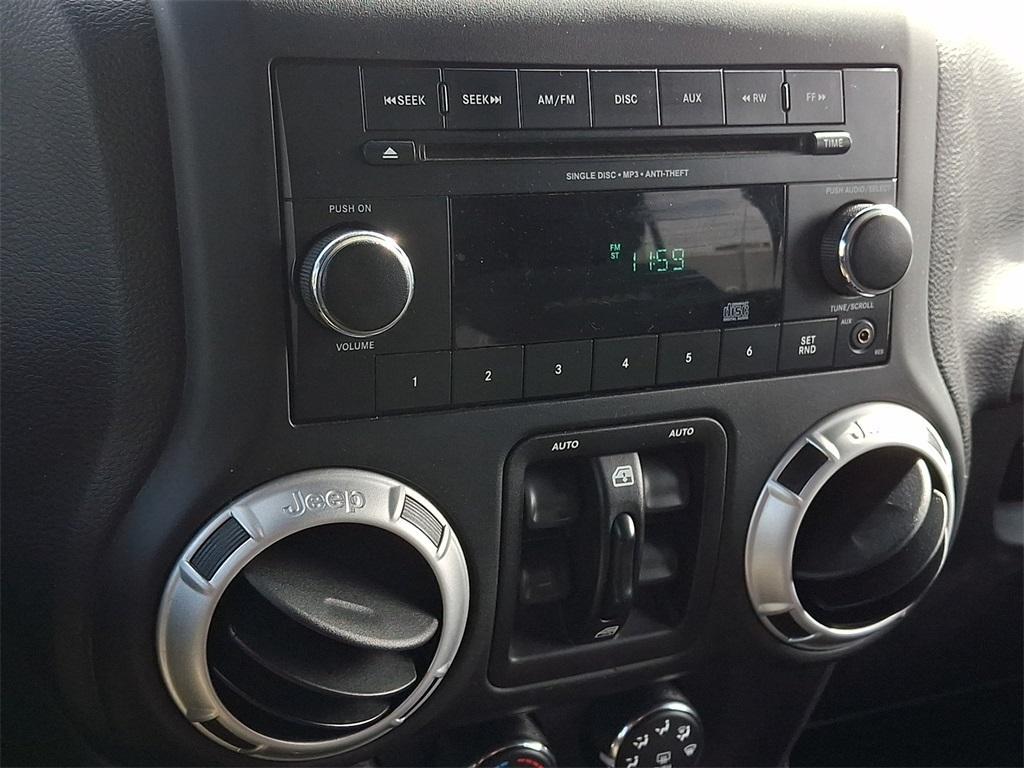 used 2016 Jeep Wrangler Unlimited car, priced at $16,404