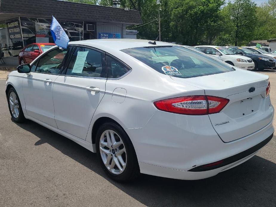 used 2016 Ford Fusion car, priced at $13,495