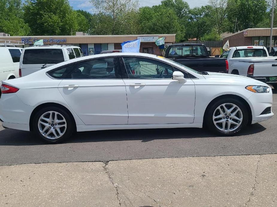 used 2016 Ford Fusion car, priced at $13,495
