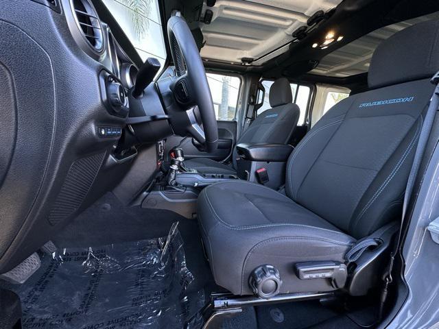 used 2023 Jeep Wrangler 4xe car, priced at $32,556