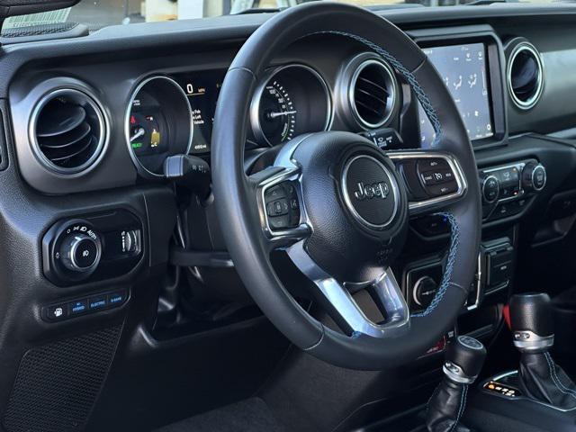 used 2023 Jeep Wrangler 4xe car, priced at $32,556