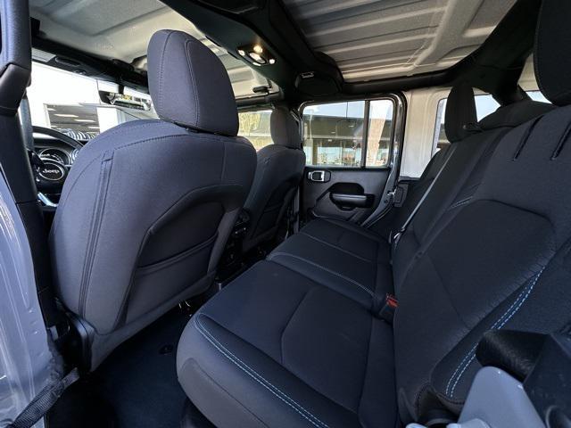 used 2023 Jeep Wrangler 4xe car, priced at $32,556