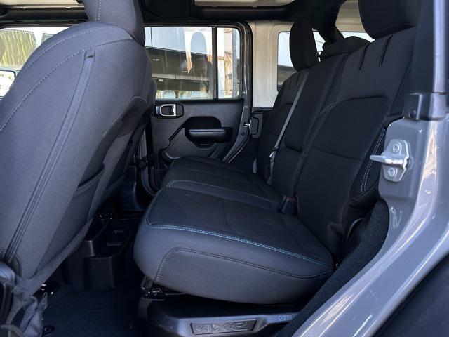 used 2023 Jeep Wrangler 4xe car, priced at $32,556