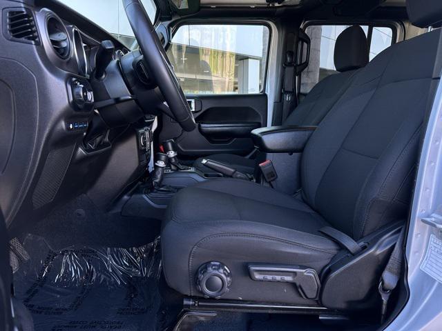 used 2023 Jeep Wrangler 4xe car, priced at $27,630