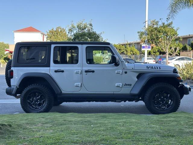 used 2023 Jeep Wrangler 4xe car, priced at $27,630