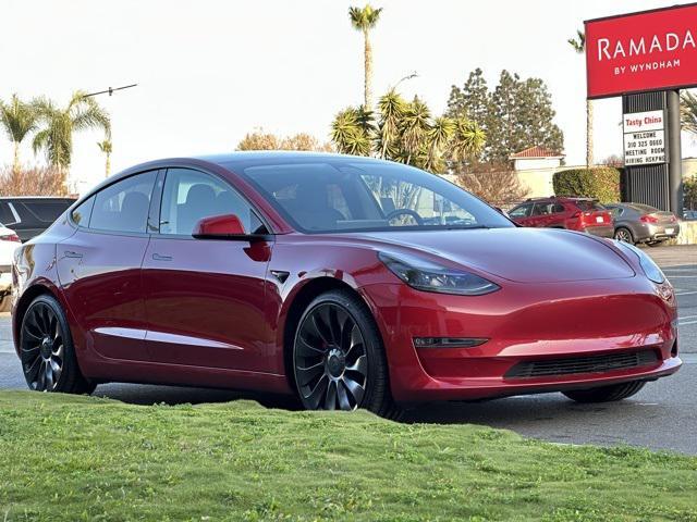 used 2023 Tesla Model 3 car, priced at $34,370