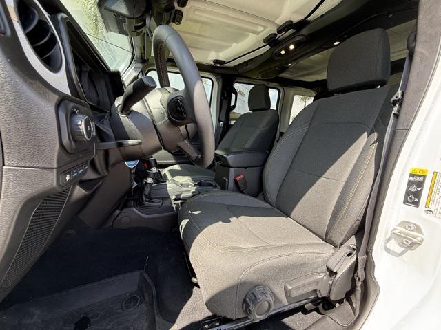 used 2024 Jeep Wrangler 4xe car, priced at $31,957