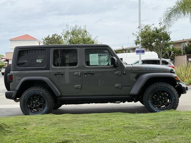 used 2023 Jeep Wrangler 4xe car, priced at $27,824