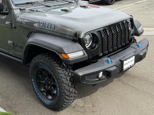 used 2023 Jeep Wrangler 4xe car, priced at $27,824
