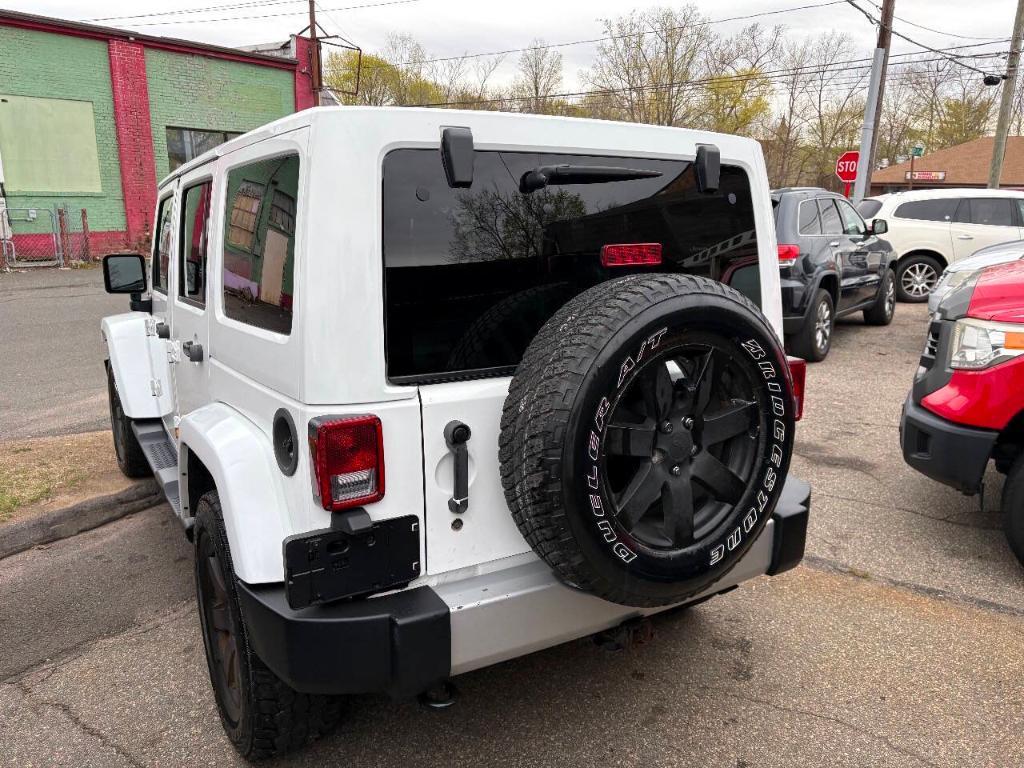 used 2013 Jeep Wrangler Unlimited car, priced at $7,988