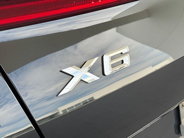 used 2022 BMW X6 car, priced at $53,400