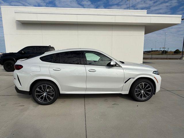 new 2025 BMW X6 car, priced at $77,875