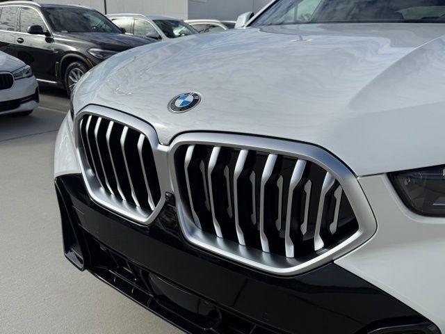 new 2025 BMW X6 car, priced at $77,875