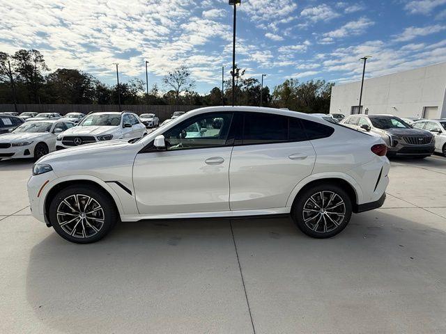 new 2025 BMW X6 car, priced at $77,875