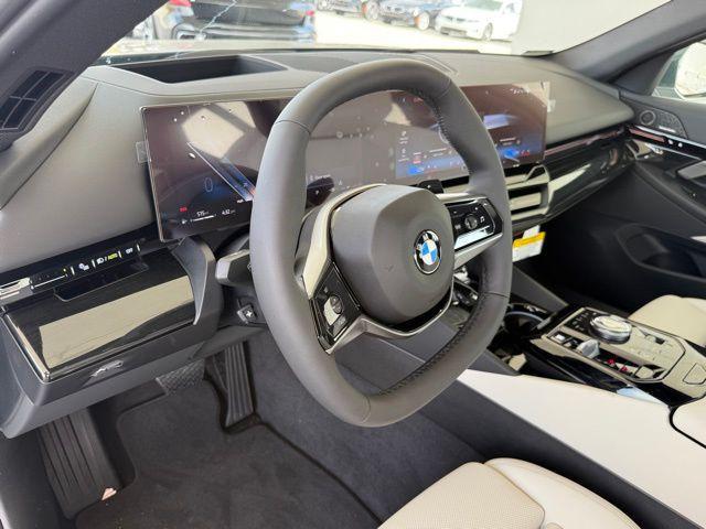 new 2025 BMW 530 car, priced at $63,375