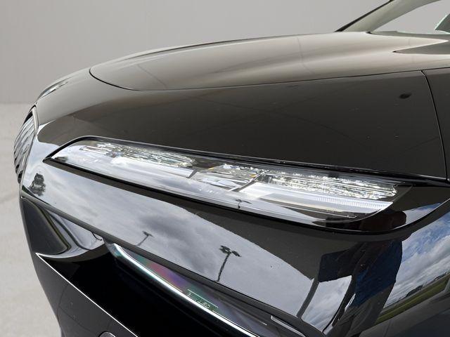 used 2025 BMW 750e car, priced at $119,011