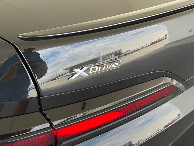 used 2025 BMW 750e car, priced at $119,011