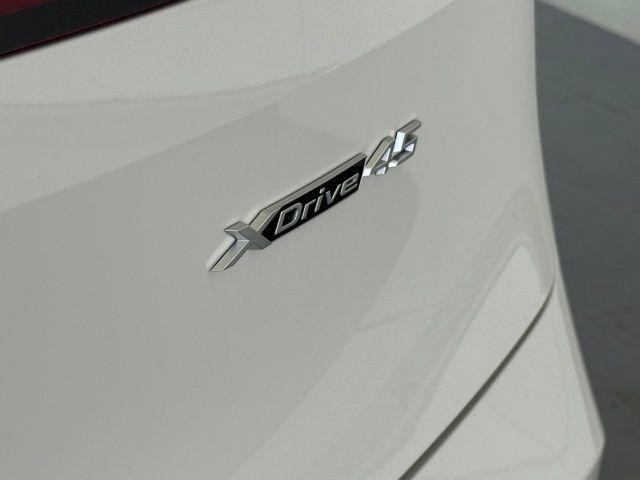 new 2026 BMW iX car, priced at $83,325