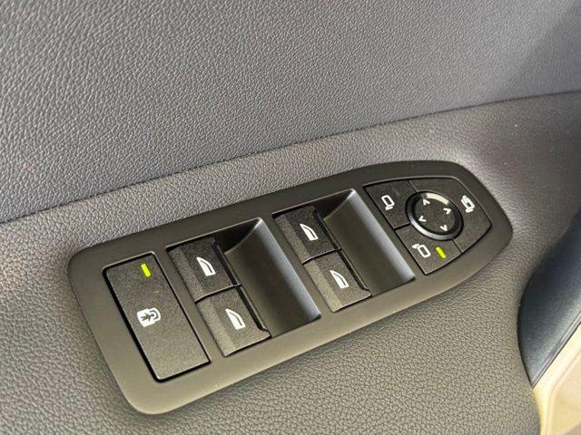 new 2026 BMW iX car, priced at $83,325