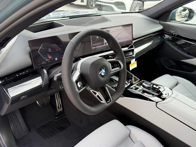 new 2025 BMW 530 car, priced at $69,875