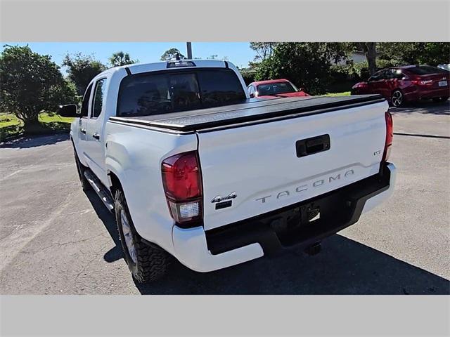 used 2021 Toyota Tacoma car, priced at $29,087