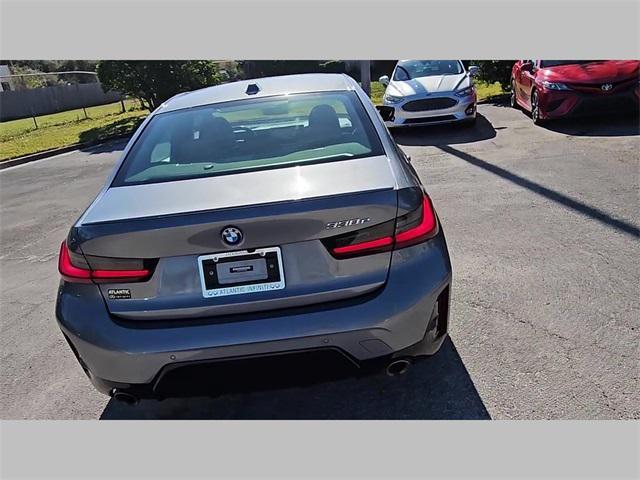 used 2023 BMW 330e car, priced at $30,673